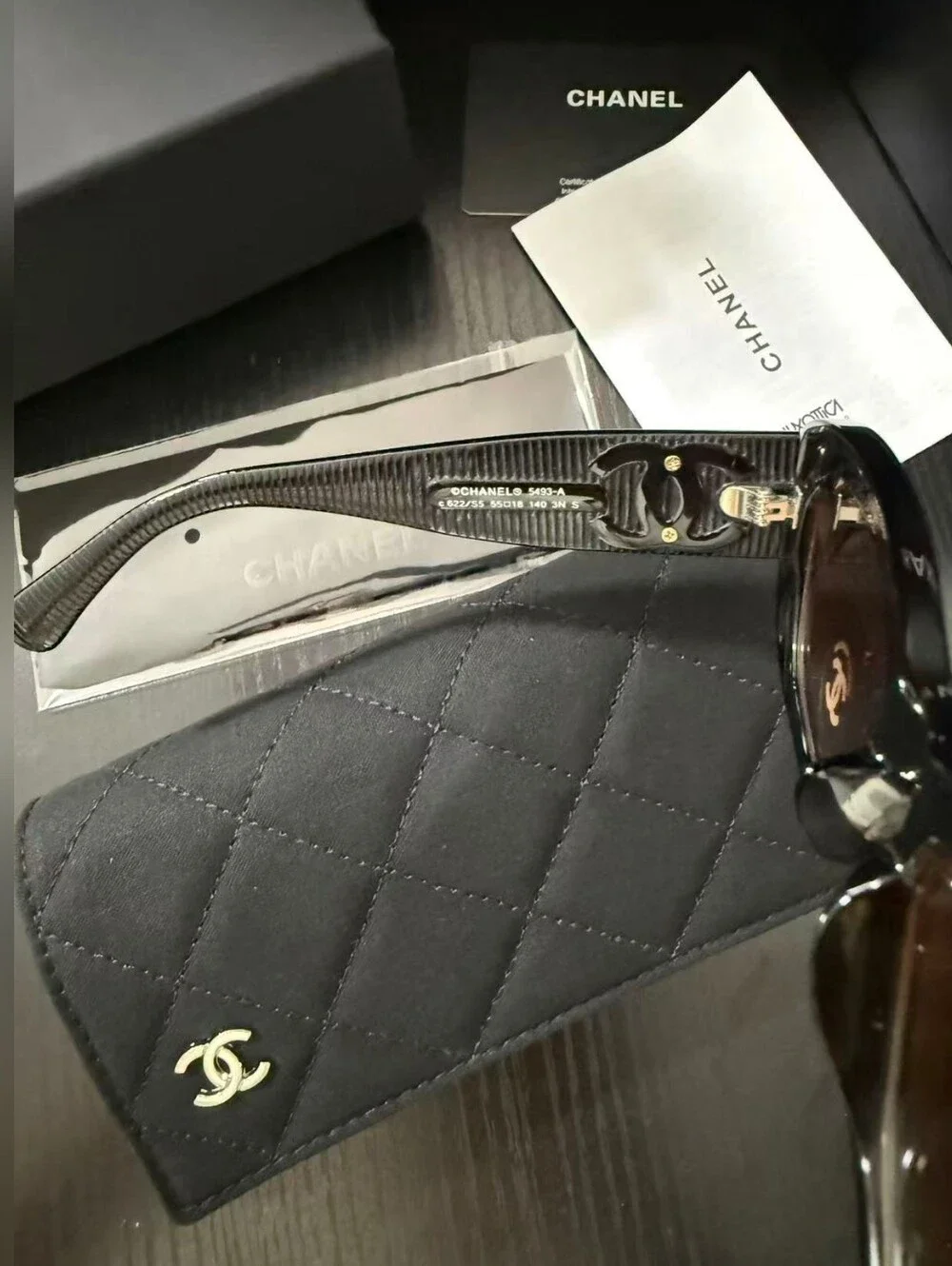 CHANEL Black Frame Sunglasses with Brown Gradient Lenses